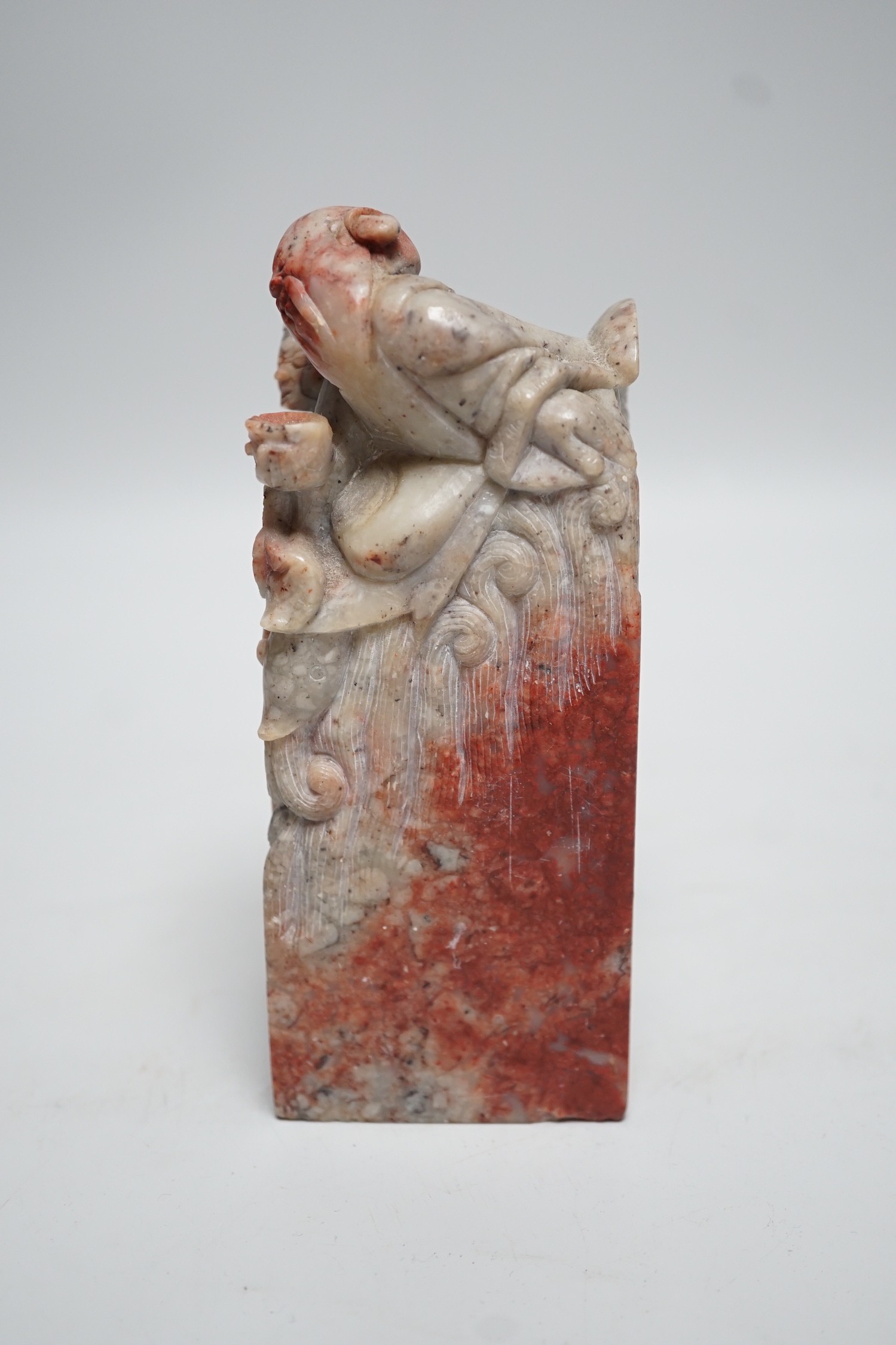 A large Chinese ‘chicken blood’ soapstone seal, Qing dynasty. 15cm